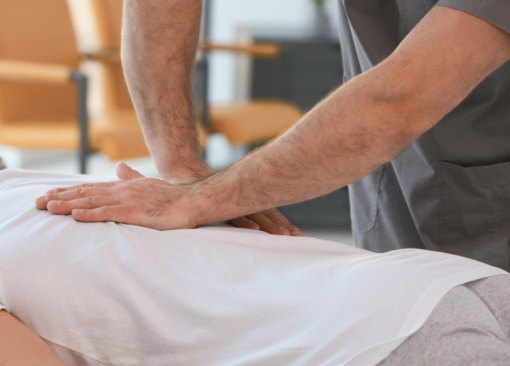 thai massage stretching on mat